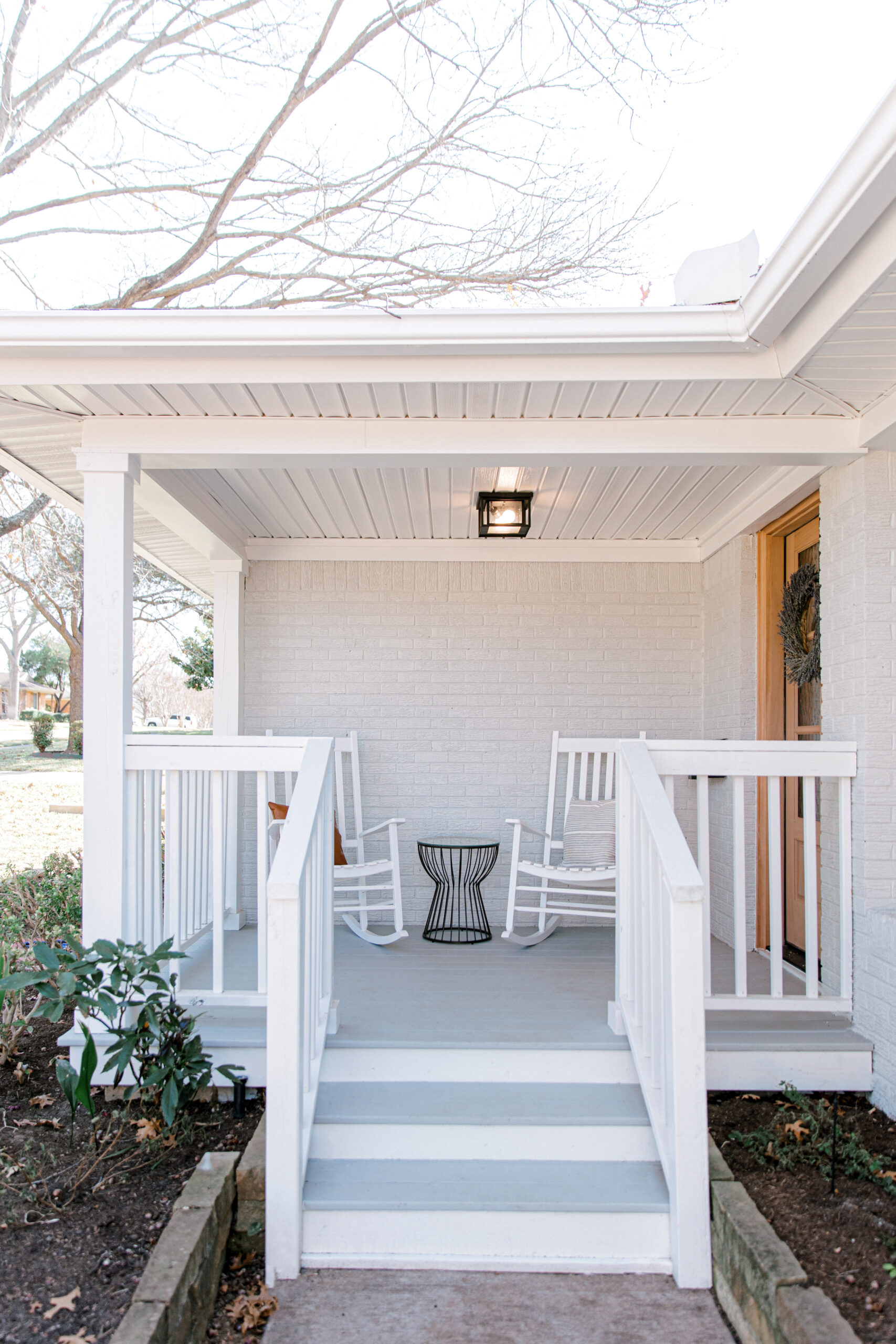 Covered concrete patio in stained wood