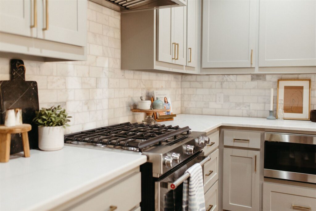 Remodeled kitchen with marble backsplash